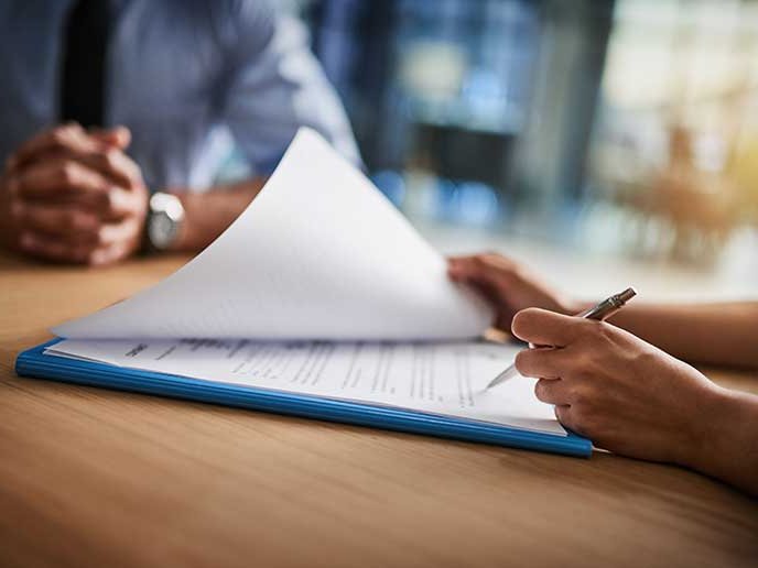 Closeup of filling in paperwork