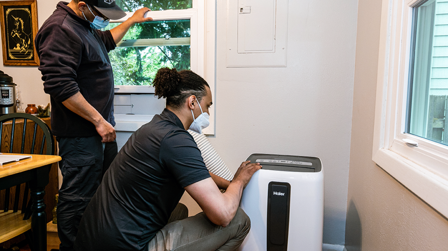 City of Portland workers installing a cooling unit